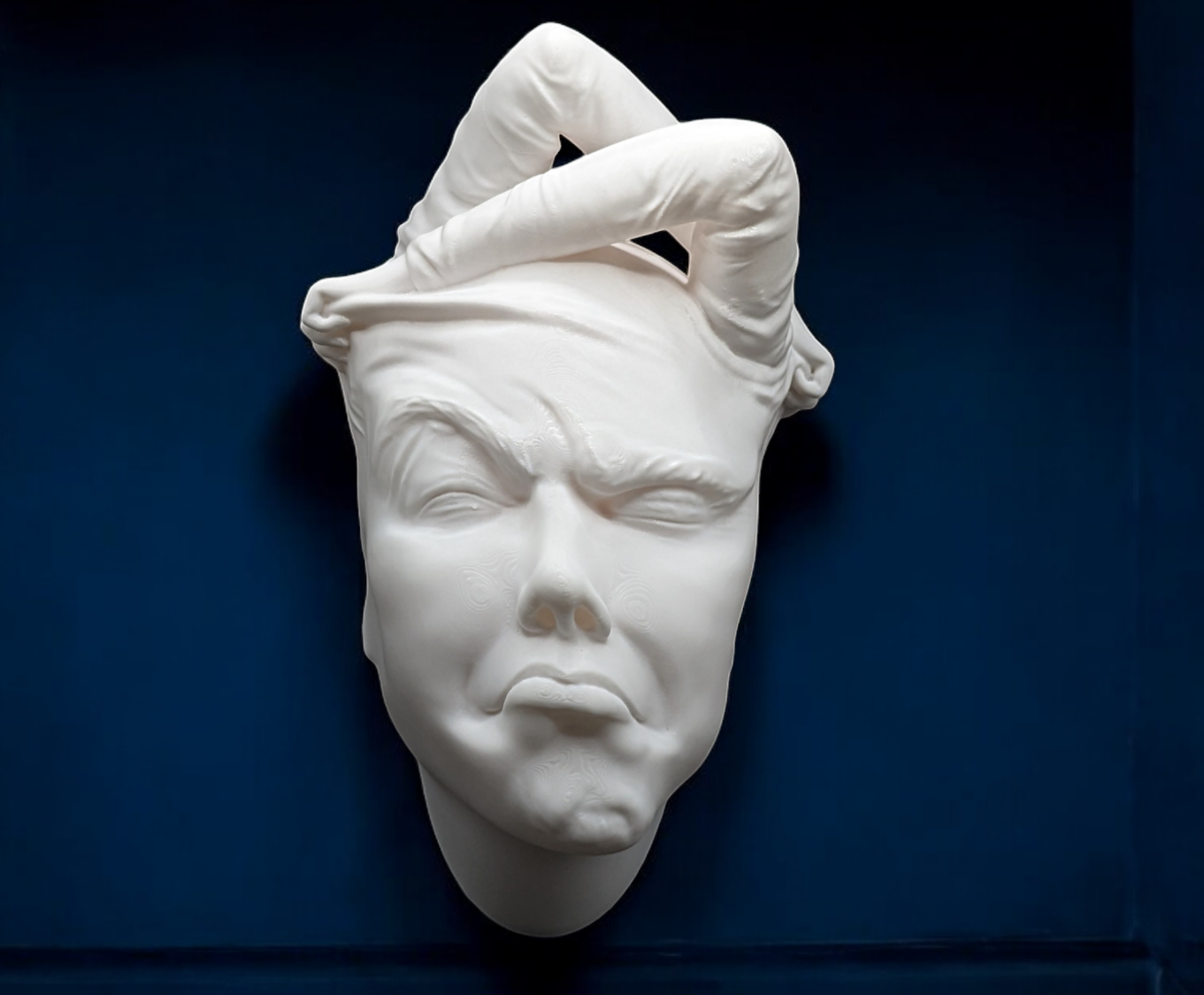 3D printed surreal face wall sculpture by BluPrints3D, a unique decorative art piece for modern home and studio walls